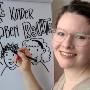 Porträt von anna Lena Wollny vor einem Plipchart