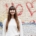 Porträtfoto von Romina Alberti vor einer Hauswand mit Graffiti